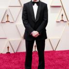 Con esmoquin de Gucci.