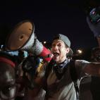 Protestors celebrate after eluding authorities and stopping traffic along Interstate 55 in Memphis, Tennessee, Sunday, May 31, 2020, during a protest over the death of George Floyd on May 25. (Patrick Lantrip/Daily Memphian via AP)
