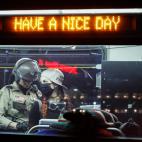 Arrested protesters are loaded onto a transport bus by police on South Washington Street, Sunday, May 31, 2020, in Minneapolis. Protests continued following the death of George Floyd, who died after being restrained by Minneapolis police officer...