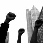 AUCKLAND, NEW ZEALAND - JUNE 01: (This image has been converted to black and white.) Protestors march down Queen Street on June 01, 2020 in Auckland, New Zealand. The rally was organised in solidarity with protests across the United States follo...