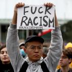 AUCKLAND, NEW ZEALAND - JUNE 01: Protestors march down Queen Street on June 01, 2020 in Auckland, New Zealand. The rally was organised in solidarity with protests across the United States following the killing of an unarmed black man George Floy...