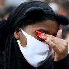 AUCKLAND, NEW ZEALAND - JUNE 01: Protestors march down Queen Street on June 01, 2020 in Auckland, New Zealand. The rally was organised in solidarity with protests across the United States following the killing of an unarmed black man George Floy...