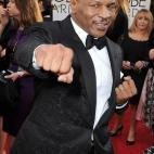 El exboxeador Mike Tyson en su llegada a la 71ª ceremonia de los Globos de Oro.