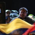 Colombian presidential left-wing candidate Gustavo Petro, speaks flanked by bodyguards holding bulletproof shields during his closing campaign rally at the Bolivar square in Bogota, Colombia on May 22, 2022. - Petro is leading the polls for the ...