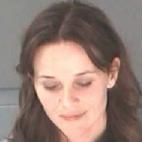 Por perturbar el orden p&uacute;blico en un control de alcoholemia realizado a su marido.