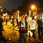 Los manifestantes (y periodistas) han denunciado el trato violento de la policía, según informan nuestros compañeros estadounidenses de The Huffington Post.