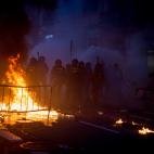 Avance de los antidisturbios por las calles del centro de Barcelona.