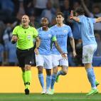 PORTO, PORTUGAL - MAY 29: John Stones, Raheem Sterling and Ruben Dias of Manchester City confront match referee Antonio Mateu Lahoz during the UEFA Champions League Final between Manchester City and Chelsea FC at Estadio do Dragao on May 29, 202...