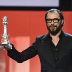 Michael R. Roskam recoge el premio al mejor guión para la película 'La entrega'.