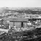 Los vecinos del barrio de Greenwood tratan de levantar sus casas después de la masacre