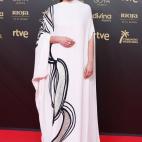 Con vestido de Fendi y joyas de Cartier.