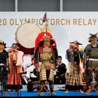 Integrantes de la Shinehago Equestrian Association en la ceremonia de relevo de la antorcha.