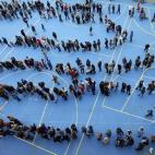 Una cola en un colegio electoral.
