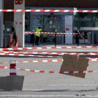 A placard reading "We want to live from our wages" is seen at a closed TotalEnergies oil station in Le Rove near Marseille, southern France, on October 11, 2022. - Around a third of France's service stations were still low on, or out of, petrol ...