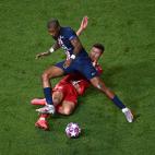 LISBON, PORTUGAL - AUGUST 23: Ivan Perisic of FC Bayern Munich tackles Presnel Kimpembe of Paris Saint-Germain during the UEFA Champions League Final match between Paris Saint-Germain and Bayern Munich at Estadio do Sport Lisboa e Benfica on Aug...