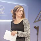 MADRID, SPAIN - DECEMBER 17: The CUP deputy in the Congress of Deputies Mireia Vehi, at her arrival to offer a press conference after meeting with the PSOE spokeswoman in Congress, Adriana Lastra, to talk about the investiture of Pedro Sanchez o...