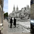 Panorámica de la calle Bayeux en Caen, Francia. Una pareja mira los trabajos de un soldado canadiense con una excavadora.