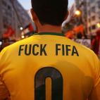 Un manifestante, durante una protesta (Photo by Mario Tama/Getty Images)