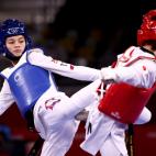 La taekwondista Su Po-Ya, ante su rival Yamada en los Juegos de Tokio 2020.