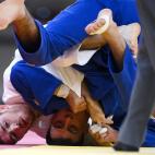 Spain's Alberto Gaitero Martin (white) competes with Ukraine's Georgii Zantaraia during their judo men's -66kg elimination round bout during the Tokyo 2020 Olympic Games at the Nippon Budokan in Tokyo on July 25, 2021. (Photo by Franck FIFE / AF...