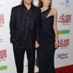 HOLLYWOOD, CA - DECEMBER 08: Actor Brad Pitt (L) and Writer/Director Angelina Jolie arrive at the 'In the Land of Blood and Honey' premiere held at ArcLight Cinemas on December 8, 2011 in Hollywood, California. (Photo by Jason Merritt/Getty Images)