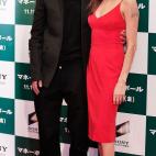 TOKYO, JAPAN - NOVEMBER 09: Brad Pitt and Angelina Jolie pose for a photograph on the red carpet during the 'Moneyball' Japan Premiere at Tokyo International Forum on November 9, 2011 in Tokyo, Japan. (Photo by Adam Pretty/Getty Images)