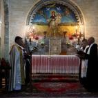 Navidades en el norte de Irak, a solo 12 kilómetros de donde los peshmergas kurdos luchan contra el Estado Islámico. (AP Photo)