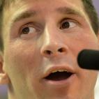 Barcelona's Argentinian forward Leo Messi gives a press conference after taking part to a training session at the Sports Center FC Barcelona Joan Gamper in Sant Joan Despi, near Barcelona, on July 17, 2013. AFP PHOTO/ LLUIS GENE (Photo ...