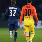 PARIS, FRANCE - APRIL 02: Lionel Messi of Barcelona and David Beckham of Paris Saint-Germain during the UEFA Champions League Quarter Final match between Paris Saint-Germain and Barcelona FCB at Parc des Princes on April 2, 2013 in Paris, Franc...