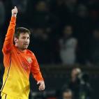 Barcelona's Argentinian forward Lionel Messi celebrates after scoring the opening goal during the Champions League quarter-final football match between PSG and Barcelona at the Parc des Princes stadium in Paris on April 2, 2013. AFP PHOTO /...