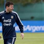 Argentina's Lionel Messi leaves the field after a training session in Buenos Aires, Argentina, Tuesday, March 19, 2013. Argentina will face Venezuela in a 2014 World Cup qualifying soccer game in Buenos Aires on March 22. (AP Photo/Eduardo Di Baia)