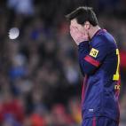 Barcelona's Lionel Messi from Argentina reacts during a Copa del Rey soccer match between FC Barcelona and Real Madrid at the Camp Nou stadium in Barcelona, Spain, Tuesday, Feb. 26, 2013. (AP Photo/Manu Fernandez)