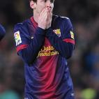 Barcelona's Lionel Messi from Argentina reacts during a Copa del Rey soccer match between FC Barcelona and Real Madrid at the Camp Nou stadium in Barcelona, Spain, Tuesday, Feb. 26, 2013. (AP Photo/Manu Fernandez)