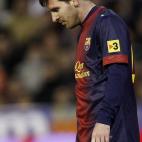 Barcelona's Lionel Messi from Argentina reacts during their La Liga soccer match against Valencia at the Mestalla stadium in Valencia, Spain, Sunday, Feb. 3, 2013. (AP Photo/Alberto Saiz)