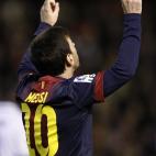 Barcelona's Lionel Messi from Argentina celebrates after scoring against Valencia during their La Liga soccer match at the Mestalla stadium in Valencia, Spain, Sunday, Feb. 3, 2013. (AP Photo/Alberto Saiz)