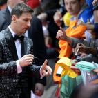 Argentina's Lionel Messi arrives on the red carpet prior to the FIFA Ballon d'Or soccer Gala 2013 held at the Kongresshaus in Zurich, Switzerland, on Monday, Jan. 7, 2013. (AP Photo/Keystone/Walter Bieri)