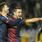 VALLADOLID, SPAIN - DECEMBER 22: Xavi Hernandez of FC Barcelona celebrates with his teammate Lionel Messi after scoring against Real Valladolid during the La Liga game between Real Valladolid and FC Barcelona at Jose Zorrilla on December 22, 20...