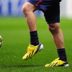 GLASGOW, SCOTLAND - NOVEMBER 07: Barcelona player Lionel Messi wearing a new pair of Boots before the UEFA Champions League Group G match between Celtic and Barcelona at Celtic Park on November 7, 2012 in Glasgow, Scotland. (Photo by Stu Forst...