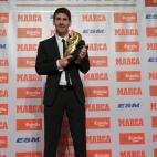 Barcelona's Argentinian forward Lionel Messi poses after receiving the European Golden Boot 2012 award for best European goalscorer of the 2011-2012 season, on October 29, 2012 in Barcelona. Messi scored a Spanish-league record of 50 goals for B...