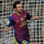 Barcelona's Argentinian forward Lionel Messi celebrates after scoring during the Spanish League football match Barcelona vs Malaga at the Camp Nou stadium in Barcelona on May 2, 2012. AFP PHOTO/ JOSEP LAGO (Photo credit should read JOSEP ...