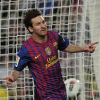 Barcelona's Argentinian forward Lionel Messi celebrates after scoring during the Spanish League football match Barcelona vs Malaga at the Camp Nou stadium in Barcelona on May 2, 2012. AFP PHOTO/ JOSEP LAGO (Photo credit should read JOSEP ...