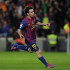 Barcelona's Argentinian forward Lionel Messi celebrates after scoring during the Spanish League football match Barcelona vs Malaga at the Camp Nou stadium in Barcelona on May 2, 2012. AFP PHOTO/ JOSEP LAGO (Photo credit should read JOSEP ...