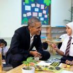 Nov. 21, 2015 "The President talks with a young refugee at a Dignity for Children Foundation classroom in Kuala Lumpur, Malaysia. She was working on a painting." (Official White House Photo by Pete Souza)