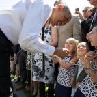 President Barack Obama greets children following the eighth annual Wounded Warrior Project's Soldier Ride on the South Lawn of the White House, April 16, 2015. (Official White House Photo by Pete Souza)
