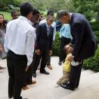 President Barack Obama greets Emmitt and Pat Smith and family, and Team 22 on the Rose Garden steps of the White House, July 29, 2104. (Official White House Photo by Pete Souza)