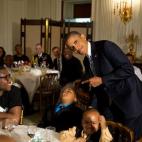 June 14, 2013 "The President called me over to pose for a photo with a young boy who had fallen asleep during the Father's Day ice cream social in the State Dining Room of the White House." (Official White House Photo by Pete Souza)