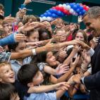 President Barack Obama greets the children of U.S. embassy staff during a reception at the Chulalongkorn University Sports Center in Bangkok, Thailand, Nov. 18, 2012. (Official White House Photo by Pete Souza)