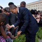 President Barack Obama and First Lady Michelle Obama greet guests at the Pentagon in Arlington, Va., on the tenth anniversary of the 9/11 attacks against the United States, Sunday, Sept. 11, 2011. (Official White House Photo by Pete Souza)