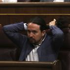 Iglesias se arregla la coleta.