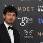 Traje de Dior, zapatos Jimmy Choo